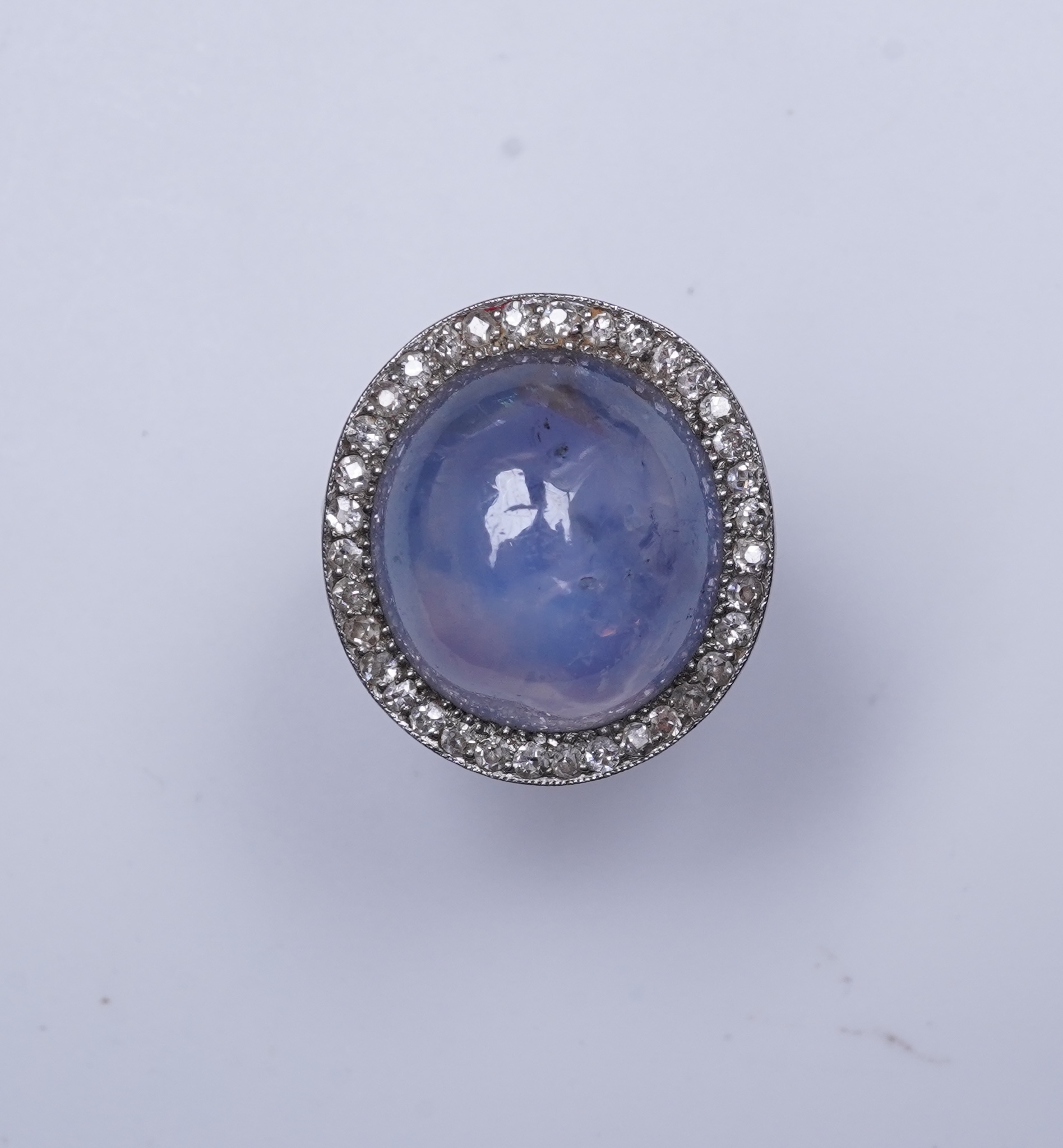 A star sapphire and diamond ring, early 20th century